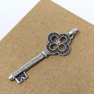 Sterling silver 925 and diamond chip key pendant